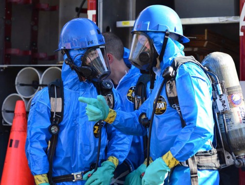 Hazmat workers wearing personal protective equipment